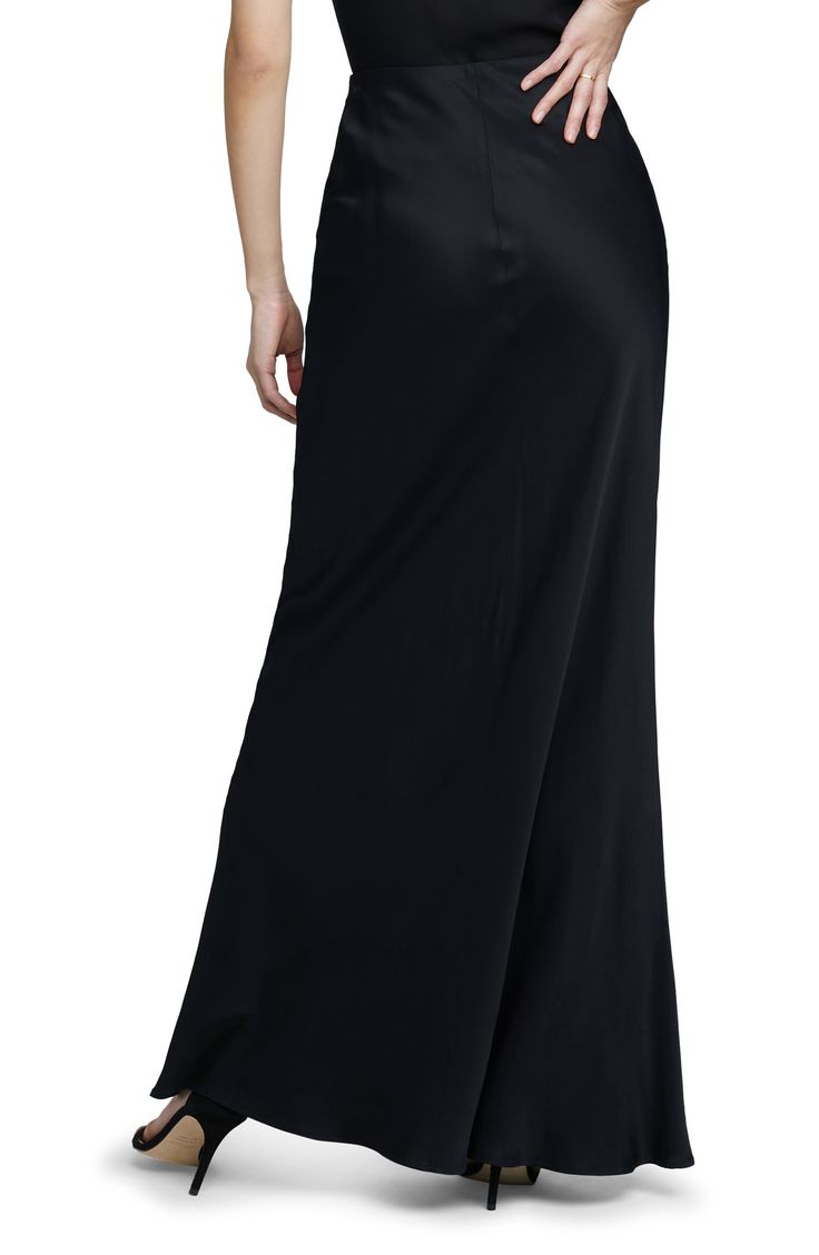 This supple satin maxi skirt is understated and elevated with a soft sheen and a comfy concealed-elastic waist. Concealed-elastic waist 55% rayon, 45% viscose Dry clean Imported Chic Full-length Silk Maxi Skirt, Evening Maxi Skirt With Satin Finish, Evening Satin Maxi Skirt With Satin Finish, Chic Silk Maxi Skirt With Satin Finish, Chic Full Length Silk Maxi Skirt, Satin Skirt With Elastic Waistband, Silk Long Skirt With Bias Cut, Chic Full-length Satin Skirt, Silk Long Skirt For Night Out