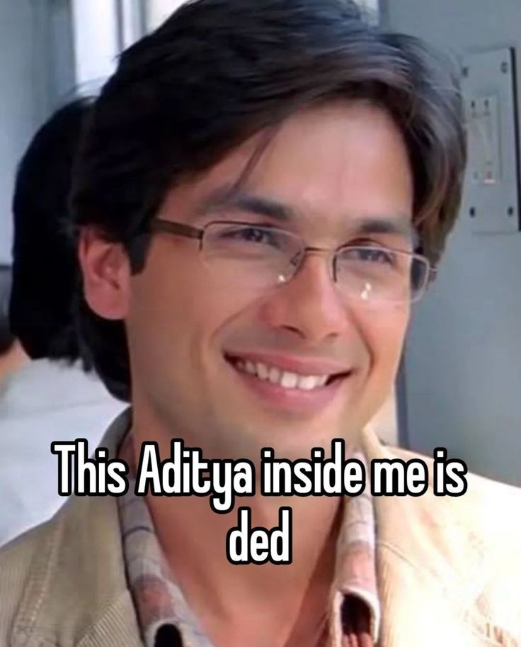 a man with glasses smiling and the caption reads, this adtiya inside me is dead