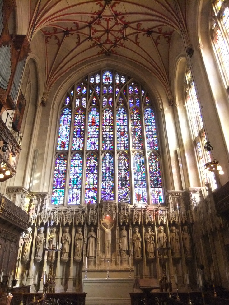 the inside of a church with stained glass windows