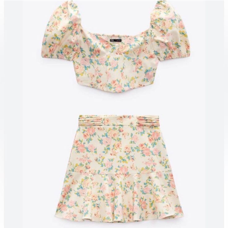 New With Tag Color: Floral Top Has Elastic In The Back And Zipper On The Side . Puffy Sleeves Skirt Open/Close Zipper On The Back And Is Full Lining Top Size: S Skirt Size: M Measures Approximately (Take Flat) Pit To Pit: 14” Top Length: 8 1/2” Waist: 13 1/2” Skirt Length: 17 1/2” Please Check Size And Measurements Before Buying All Photos Were Taken By Me Except The First And The Last Two That Are Used To Show How The Item Fits. Same Day Shipping Please Feel Free To Ask Any Question All Sales A Fitted Skirt Set For Vacation In Spring, Fitted Skirt Set For Spring Vacation, Casual Summer Mini Skirt Set, Fitted Cotton Skirt Set For Summer, Fitted Skirt Set For Summer Day Out, Casual Cream Sets For Spring, Chic Summer Skirt Set With Short Sleeves, Chic Spring Mini Skirt Set, Chic Mini Skirt Set For Spring