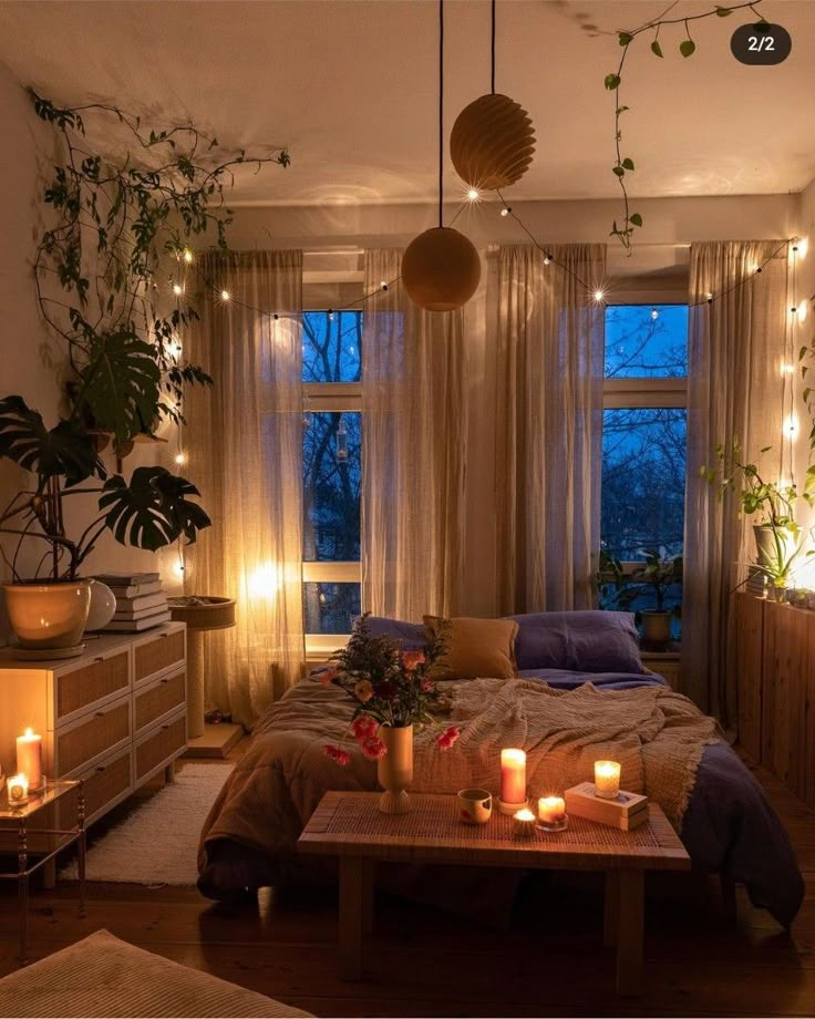 a living room filled with furniture and candles