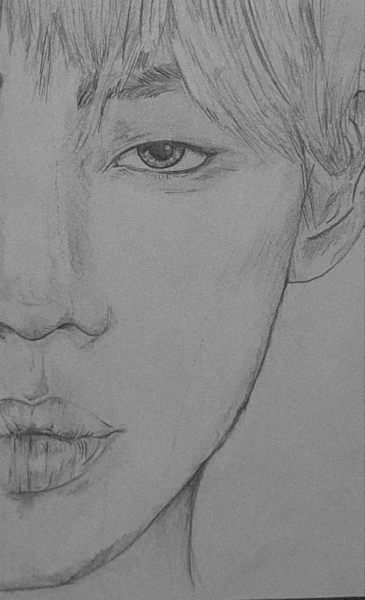 a pencil drawing of a young man's face