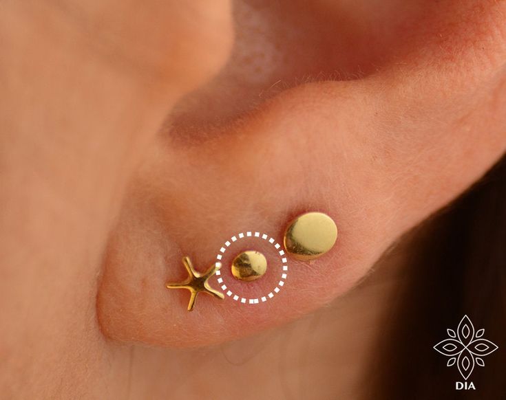 14K SOLID GOLD flat dot stud earring. 2.4mm diameter/ 20 gauge . SINGLE Perfect for a variety of piercing locations: nostril / lobe / 3rd, 2nd hole earring / tragus / conch / helix / cartilage ---> Features: ♦ Material: 14k SOLID GOLD ♦ Earring size: length: diameter: 2.4 mm ♦ Thickness: 20 gauge = 0.8 mm. Select your preference in shape at the top right of this page. L shape (6*5.5 mm) / Right screw shape / Left screw shape / Bone end (8mm approx.) / Straight end post with silicone back (10m Dainty Hypoallergenic Round Nose Studs, Tiny Rose Gold Round Piercings, Tiny 14k Gold Nose Studs, Dainty Gold Round Nose Studs, Minimalist Pierced Yellow Gold Nose Studs, Dainty Internally Threaded Yellow Gold Nose Studs, Dainty Hypoallergenic Yellow Gold Nose Stud, Minimalist Yellow Gold Round Nose Studs, Internally Threaded Yellow Gold Nose Studs