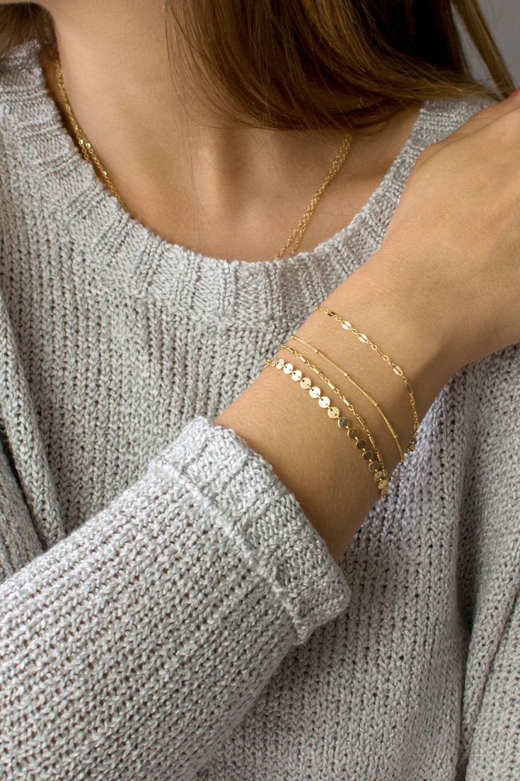 "Beautiful dainty chain bracelet in 14K gold or sterling silver. Our delicate bracelets are offered in four unique styles: coin chain, tube chain, lace chain or satellite chain. Pick one or more for a custom layering look just for you or as a perfect holiday gift. *listing is for ONE delicate bracelet in chain of your choice D E T A I L S * choice of chain: coin chain, tube chain, lace chain or satellite chain * 100% 14K gold fill or sterling silver chain and findings * strong lobster clasp clos Anting Manik, Bracelets Design, Gold Armband, Dainty Chain, Bracelet Chain, Gold Bracelet Chain, Layered Bracelets, Bracelets For Women, Bracelet Gold