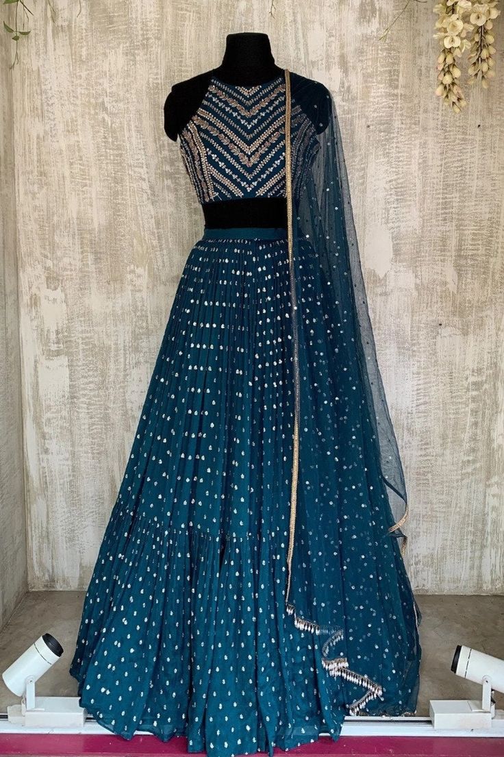 ✦We provide high quality Indian Ethnic wear for women. We house a wide range of collections of dresses, which include the designer lehenga choli ,bridesmaid lehenga choli,festival lehenga choli,latest gowns, party wear Lehenga Choli,indian wedding lehengas,ready made lehenga,sabiyasachi lehengas,bollywood designer outfits and many more. Check out our bridal collection, which houses numerous bridal Lehenga Cholis, reception gowns, designer sarees, and is the ultimate heaven for all the brides out Sangeet Lengha, Teal Blue Lehenga, Party Wear Lengha, Blue Lehenga Choli, Lehenga Choli Latest, Lehenga Choli Designs, Indian Wedding Lehenga, Lehenga Choli For Women, Bridesmaid Lehenga