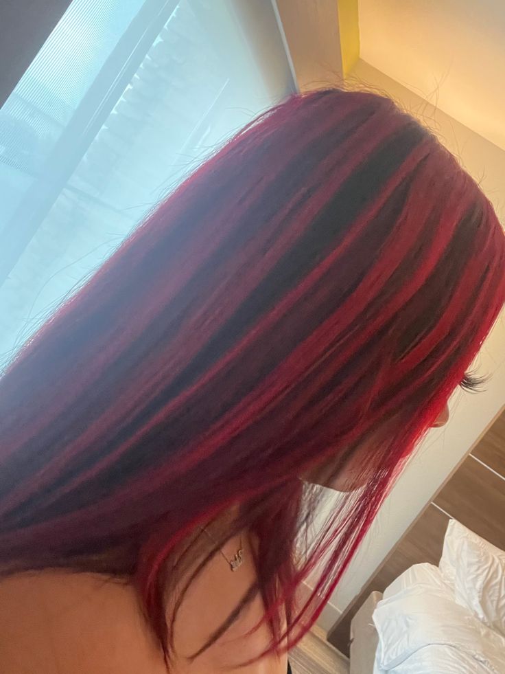 red hair red highlights hair inspo Hair Inspo Red Highlights, Hair Styles With Red Highlights, Red Skunk Highlights On Dark Hair, Thick Red Highlights On Black Hair, Hair Color Stripes Ideas, Black Highlights In Red Hair, Red Chunks In Black Hair, Brown Hair With Red Skunk Stripe, Red On Brown Hair Highlights