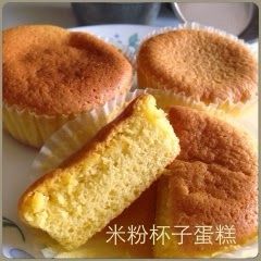 three cupcakes sitting on top of a plate with chinese writing in the middle