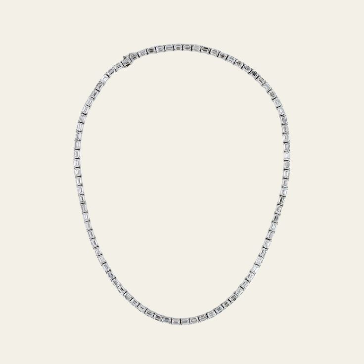 Live large in a classic diamond chain featuring sophisticated emerald-cut diamonds. As the diamonds are lab-grown, this necklace is a fraction of the price of its mined diamond counterpart, and the diamonds are just as real and authentic. We love an emerald-cut diamond’s clean lines and striking shape, which completely invigorate the men’s fine jewelry staple. Wear it with an oversized t-shirt for daytime swagger, or with a suit for formal events. ‌Details18K White Gold84 Emerald-Cut Lab-Grown D Jewelry Staples, Diamond Chain, The Men, Emerald Cut Diamonds, Oversized T Shirt, Watch Necklace, Oversized Tshirt, Ring Bracelet, Emerald Cut