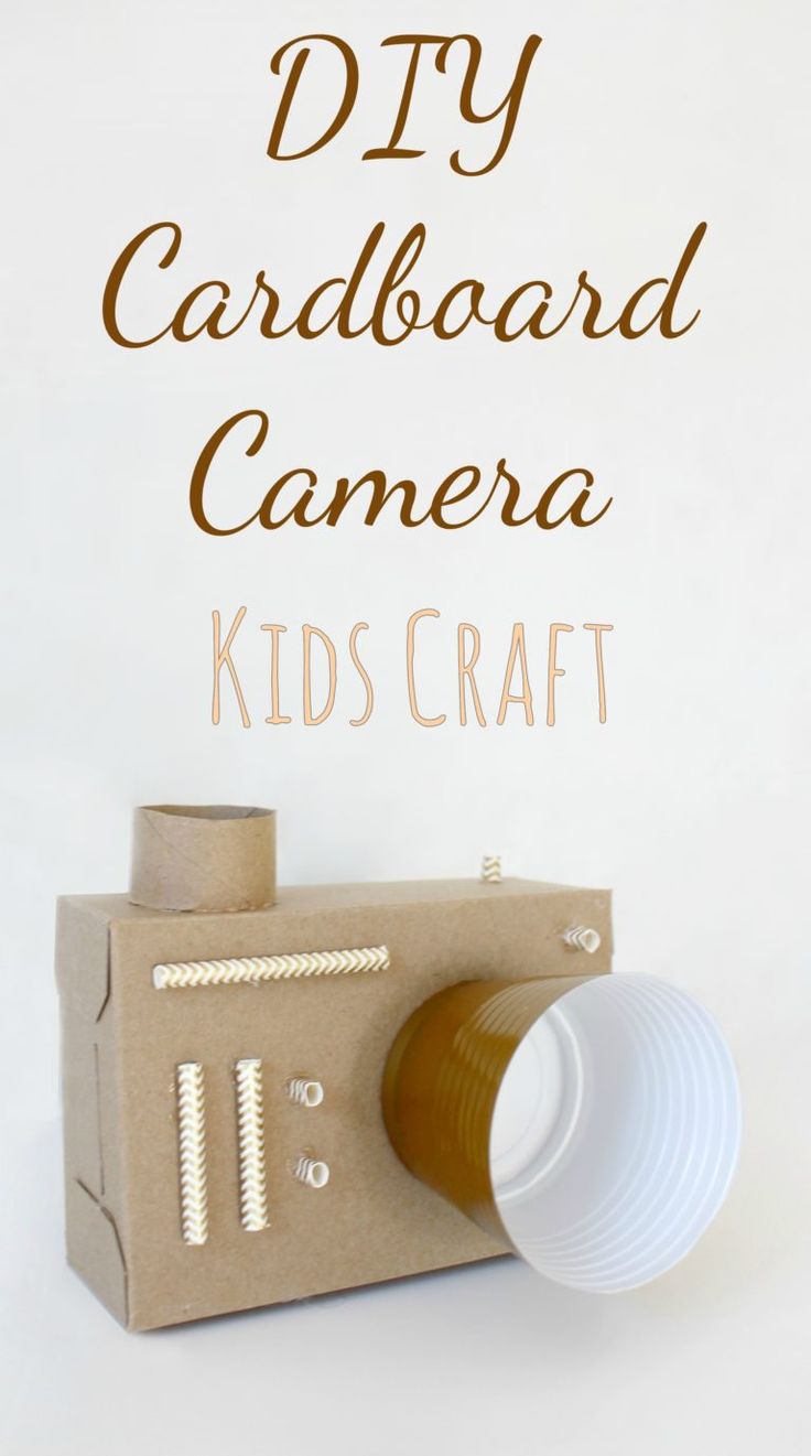 a cardboard camera with the words diy cardboard camera kids craft on it's side