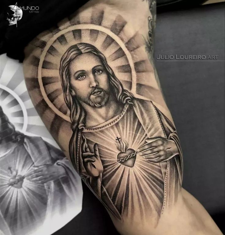 jesus tattoo on the arm and leg