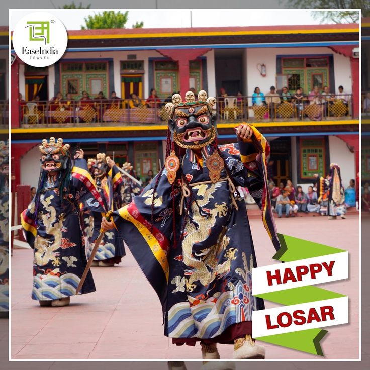 people dressed in traditional chinese costumes and masks walking down the street with their arms outstretched