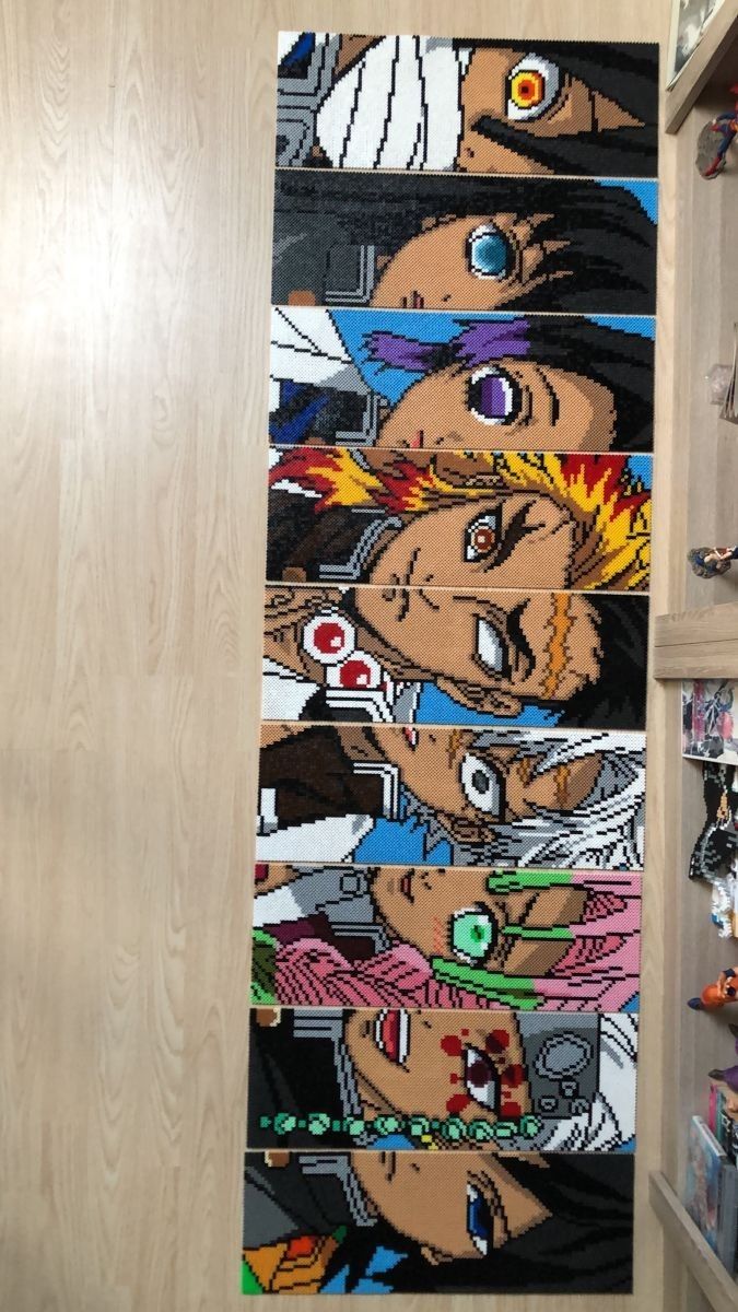 a wooden door with an image of anime characters painted on it