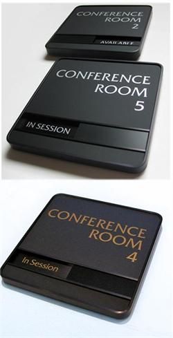 three different types of conference room signs