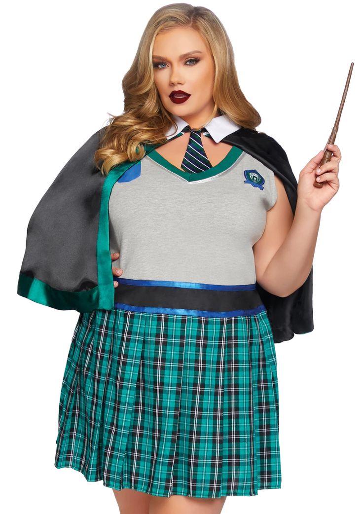 a woman dressed in a harry potter costume holding a wand and posing for the camera