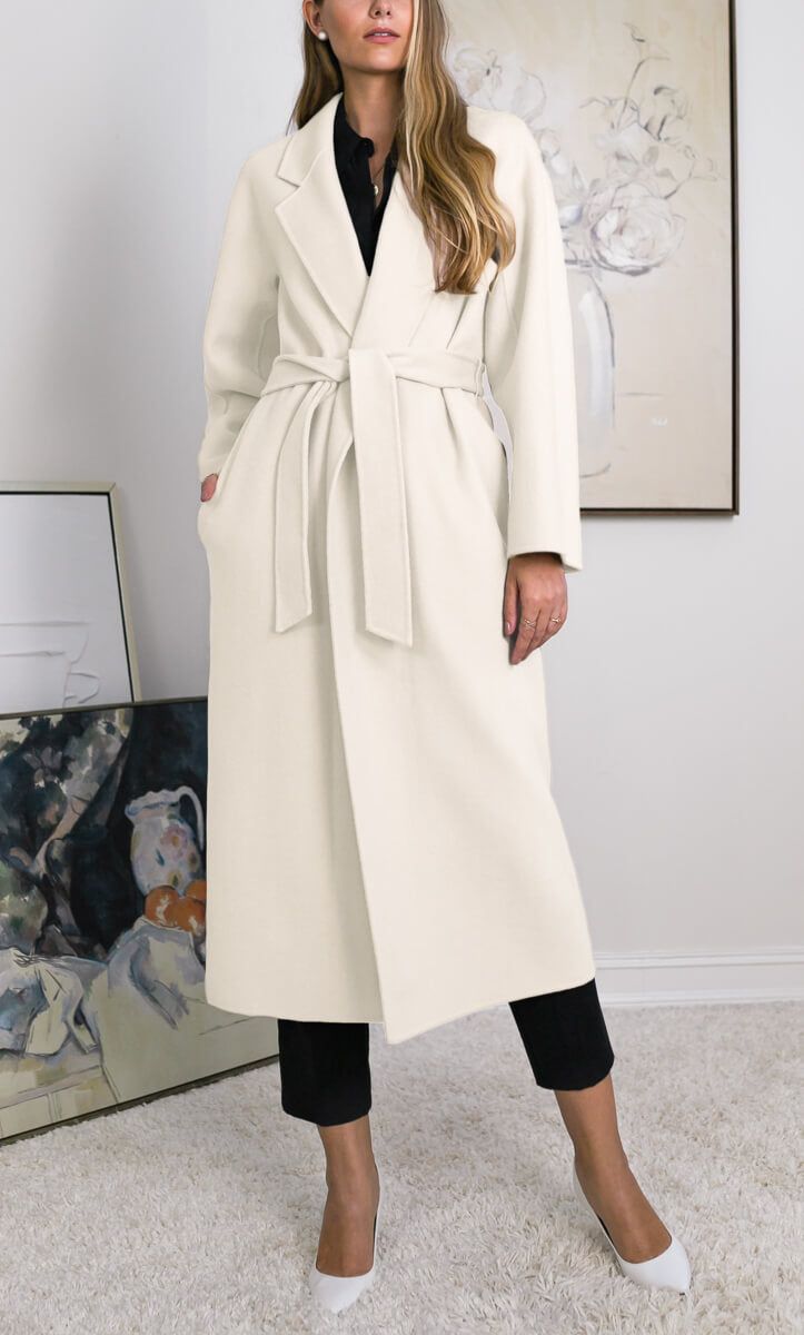 A signature classic among celebs and royalty – the cashmere winter wrap overcoat. The Marcella overcoat is made with dual layers of heavyweight cashmere-wool fabric entirely stitched together by hand, offering an unmatched combination of warmth, softness and lightness. Hand-stitched, double-faced cashmere-wool fabric. Classic wraparound overcoat with removable belt. Hidden side pockets at the waist. Form-fitting silhouette. Hits below the knee. SIZING: This style runs true to size. If you're loo Hair Winter, Winter Overcoat, Winter Wrap, Cashmere Fabric, Wool Overcoat, Cashmere Wrap, Cashmere Turtleneck, Wrap Cardigan, Cashmere Coat