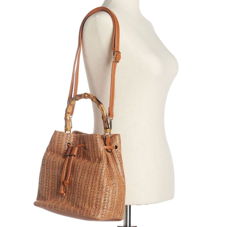 Add a breezy flair to your ensembles in this bucket bag from New York and Company. The Richie is the ideal blend of toughness and style thanks to its robust woven straw fabric and sturdy bambooÃƒâ€šÃ‚Â h andle. Spring Bucket Bag With Adjustable Strap In Straw, Everyday Woven Leather Straw Bag In Bucket Shape, Trendy Brown Basket Bucket Bag, Casual Bucket Hobo Bag With Handles, Trendy Straw Bucket Bag With Double Handle, Casual Bucket Bag With Bamboo Handle For Daily Use, Trendy Straw Bucket Bag With Braided Handles, Spring Straw Bucket Bag With Adjustable Strap, Spring Bucket Straw Bag With Adjustable Strap