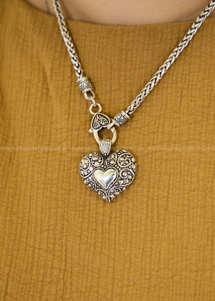 Silver-Tone Romance—Heartfelt Jewelry For Every Occasion! 💎💫 Featuring a silver tone heart necklace with toggle clasp and matching earrings. Details Earrings: Length 1.00" x Width 0.50" Chain Length: 16.00" Lead & Nickel Free Elegant Silver Toggle Necklace With Heart Charm, Metal Heart Necklace With Lobster Clasp, Hypoallergenic Heart Shaped Metal Necklace, Hypoallergenic Heart-shaped Metal Necklace, Silver Metal Heart Necklace For Mother's Day, Nickel-free Silver Heart Necklace, Silver Nickel-free Heart Necklace, Nickel-free Jewelry For Valentine's Day, Everyday Heart-shaped Jewelry With Sterling Silver Clasp