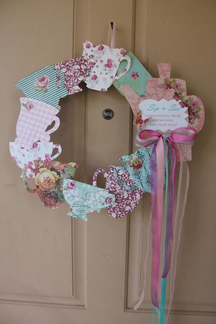 a tea party wreath hanging on a door with the words, 15 daily tea party ideas you must definitely try