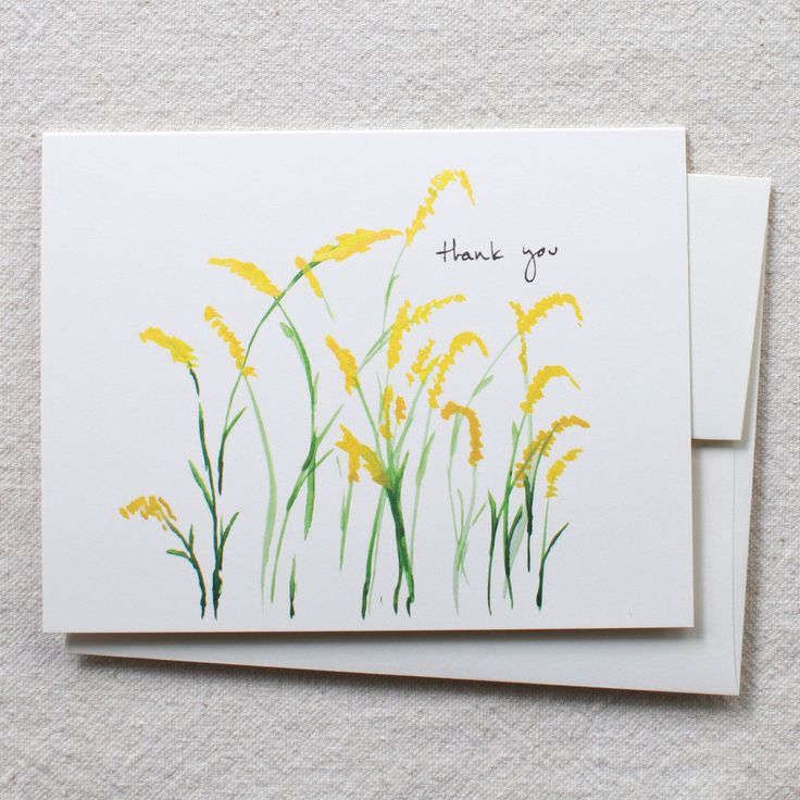 two thank you cards with yellow flowers and green stems on white paper, one has the words thank you written in black ink