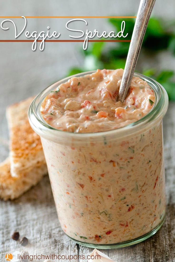 a glass jar filled with food sitting on top of a table