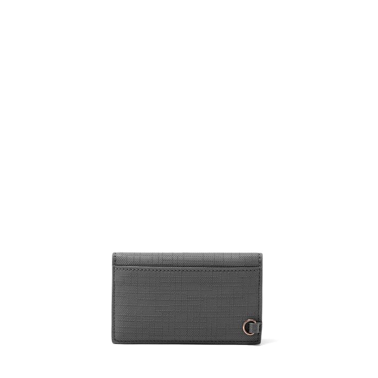 Keep business, bank, metro or other cards safe and snug in our minimalist Card Case in Charcoal Grey. Ideal for events, quick errands or coffee breaks, the sleek accessory keeps currency close at hand or in your pocket. It also fits perfectly inside the Legend, Classic, Midi and Petite totes, so switching between bags is a cinch. Functional Business Card Holder With Interior Slots, Functional Rectangular Business Card Holder, Minimalist Business Card Holder With Rfid Blocking, Minimalist Rfid Blocking Card Holder For Business, Functional Business Card Holder With Card Slots, Minimalist Business Card Holder With Interior Slots, Business Card Holder With Cell Phone Pocket, Modern Rectangular Wallets For Work, Rectangular Wallets With Card Slots For Work