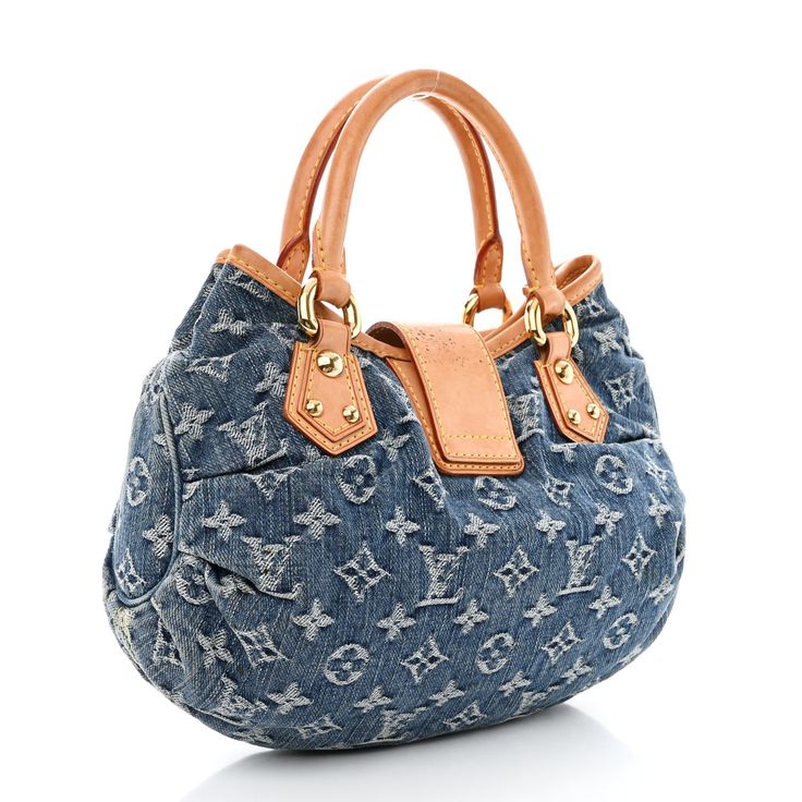 This is an authentic LOUIS VUITTON Monogram Denim Pleaty in Blue. This is a stylish bag that is crafted of Louis Vuitton monogram pleated denim. This mini handbag features a vachetta cowhide leather handle with polished gold toned hardware and a crossover strap with a gold toned press-lock. This opens to a saffron yellow microfiber interior with a pocket. Pleated Denim, Saffron Yellow, Mini Handbag, Mini Handbags, Stylish Bag, Authentic Louis Vuitton, Leather Handle, Cowhide Leather, Crossover