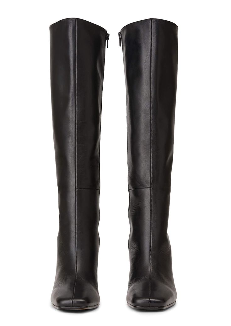 Lending a sleek aesthetic and modern vibes, the Havana knee-high boot is set to impress this AW22. Featuring a slender stiletto heel, an on-trend squared toe and a sleek fitted upper. As a zip-up boot, this style finishes just below the knee. Pair with tucked in pants or a midi-skirt for your next go-to. -Material: ALL NEW Leather Upper & Lining -Sole: Resin sole -Fit: Runs true to size -Toe-shape: Squared -Features: Inner matching zip -Heel: 10.5cm stiletto heel Leg Height x Calf Circumference Elegant Tall Heeled Boots For Workwear, Elegant Tall Heeled Boots For Work, Luxury Fitted Knee-high Boots For Work, Fitted Luxury Knee-high Boots For Work, Sleek Leather Over-the-knee Heeled Boots, Elegant Tall Knee-high Boots For Workwear, Luxury Fitted Square Toe Knee-high Boots, Leather Heeled Boots With High Shaft For Night Out, Chic Tall Leather Knee-high Boots