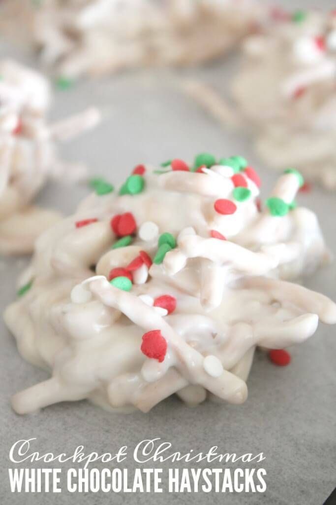 white chocolate haystacks with candy sprinkles are on a baking sheet