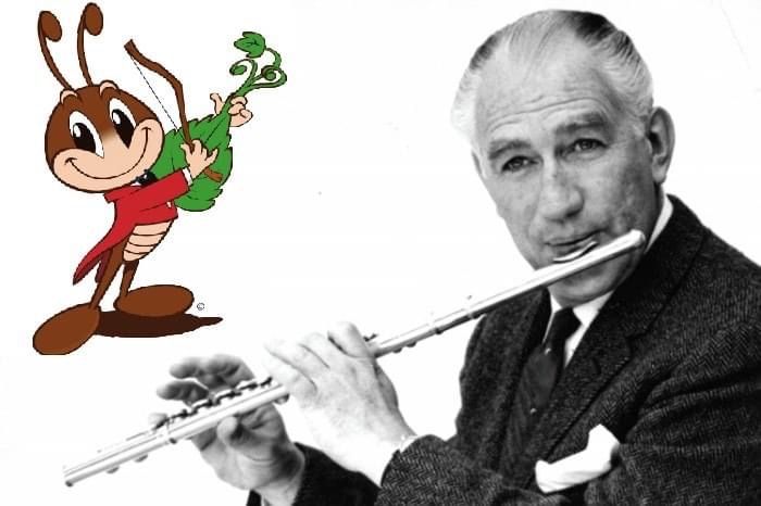 an older man is playing the flute in front of a cartoon character with a monkey on his back