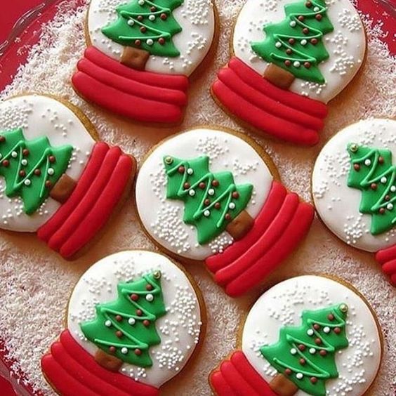 christmas cookies decorated with green and red icing