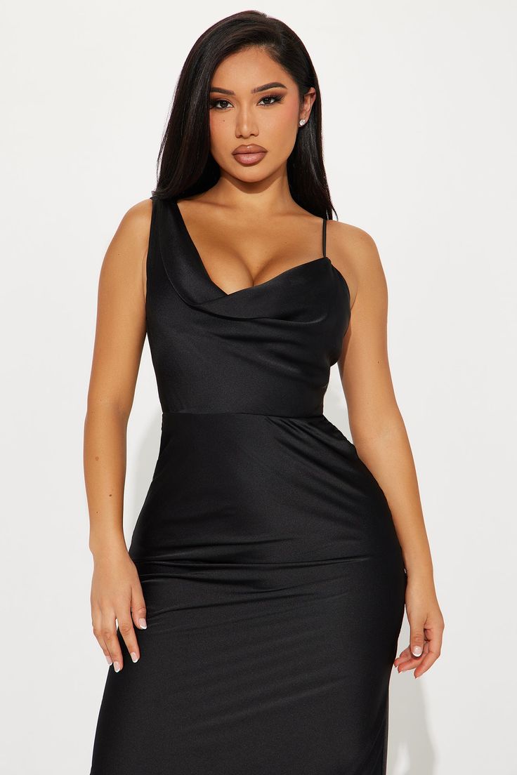 Available In Black. Satin Gown Sleeveless Cowl Neckline Adjustable Spaghetti Strap Hidden Back Zipper Lined Stretch Self: 100% Polyester Lining: 100% Polyester Imported | Adore Satin Gown Dress in Black size XS by Fashion Nova Fitted Slip Dress With Asymmetrical Neckline For Night Out, Satin Cami Dress For Party, Fitted One-shoulder Slip Dress For Date Night, Sleeveless Satin Bodycon Dress For Night Out, Black Cami Dress For Night Out, Cami Mini Dress For Night Out, Flirty Sleeveless Slip Dress For Cocktail, Flirty Sleeveless Slip Dress For Night Out, Glamorous Sleeveless Satin Bodycon Dress