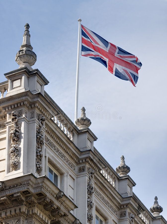 the british flag is flying on top of an old building in london, england royalty images