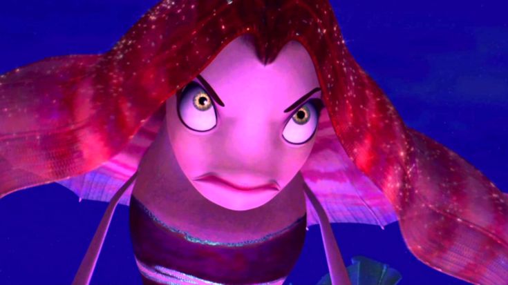 an animated character with red hair and big eyes