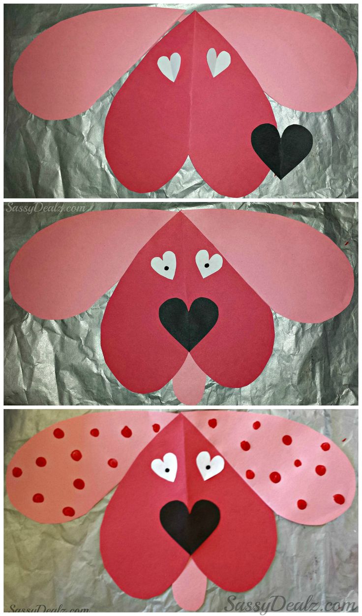 four different pictures of paper hearts with the shape of a dog's head