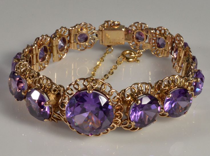 "The bracelet has absolutely mesmerizing effect on anybody who is seeing it. A long array of 15 graduated color changing lab Alexandrites set into rose gold filigree links. Alexandrites thought to bring luck, good fortune and love. The gemstones are changing the color from deep amethyst like purple under the sun light or daylight bulbs to blue sapphire color under yellowish candle light, or incandescent bulb. The gems are eye clear with some minuscule inclusions visible with magnifying glass. Th Vintage Gemstone Jewelry, Purple And Gold Jewelry, Ethereal Jewelry, Daylight Bulbs, Light Jewelry, Sun Light, Sapphire Color, Jewelry Fashion Trends, Candle Light