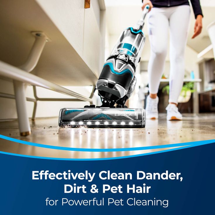 a person using a vacuum to clean the floor with a blue and white banner that says, effectively clean dander, dirt & pet hair for powerful pet cleaning