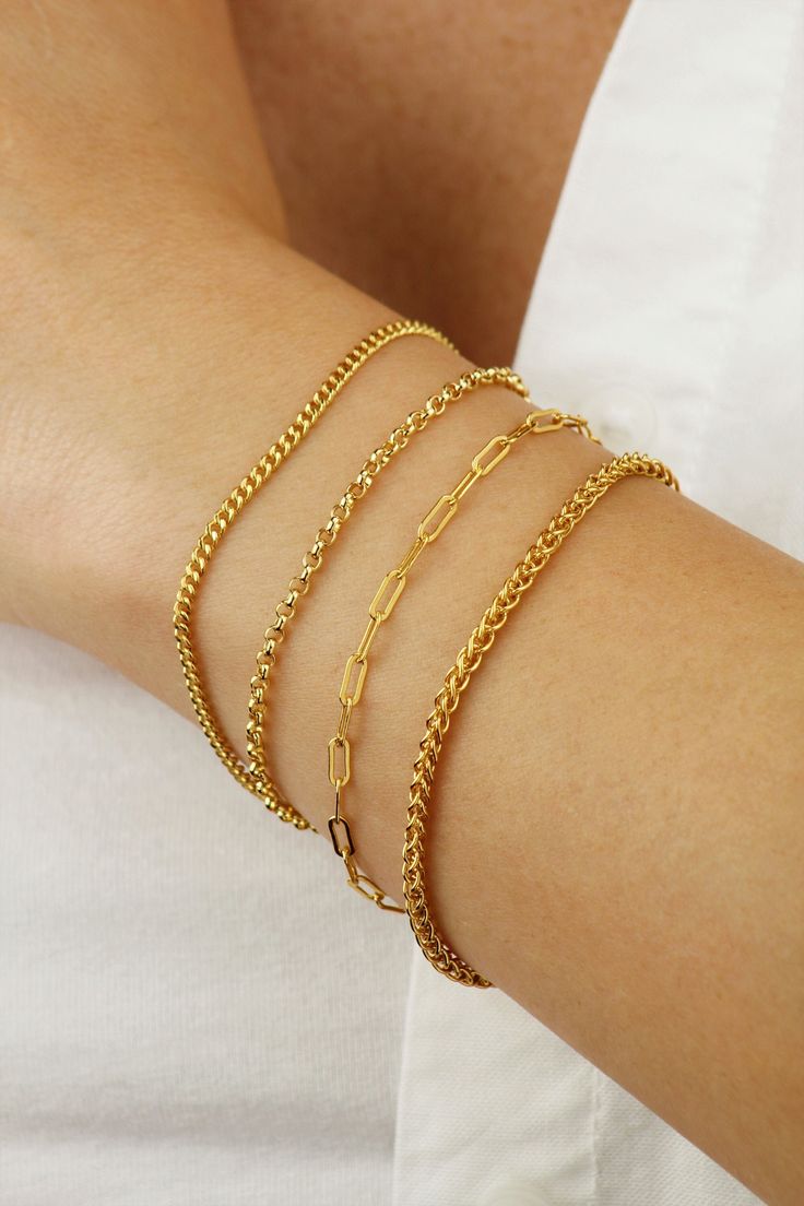 14k Gold Filled Chain Bracelet. These are Dainty and Discrete Yet Striking and Eye-Catching. A Minimalist Gold Bracelet That You Can Wear on Its Own or Layer up. Your Perfect Everyday Companion. If You Are Looking for A Quality Chain Bracelet that Keeps its Shine, this is Ideal For You.  Tarnish Resistant and Hypoallergenic Bracelet. DIMENSIONS Material: 14k Gold Filled Bracelet Length: 7.5 Inch (6.5 Inch Plus 1 Inch Extension) Style A - 2.3mm Curb Chain Bracelet Style B - 2.5mm Rolo Chain Brace Minimalist Gold Plated Curb Chain Bracelets, Minimalist Gold-plated Curb Chain Bracelets, Dainty Curb Chain Bracelets For Formal Occasions, Dainty Curb Chain Bracelet For Formal Occasions, Dainty Curb Chain Bracelet For Formal Events, Dainty Gold Bracelet With Box Chain, Gold Sterling Silver Box Chain Bracelet Gift, Minimalist Adjustable Curb Chain Bracelets, Minimalist Adjustable Curb Chain Bracelet