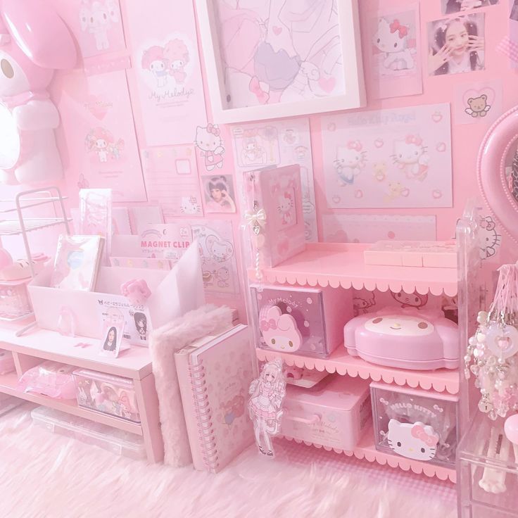 a pink room with hello kitty furniture and accessories