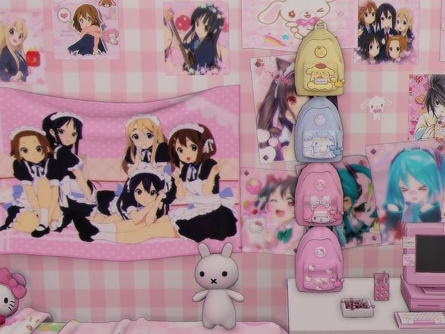 there are many anime pictures on the wall