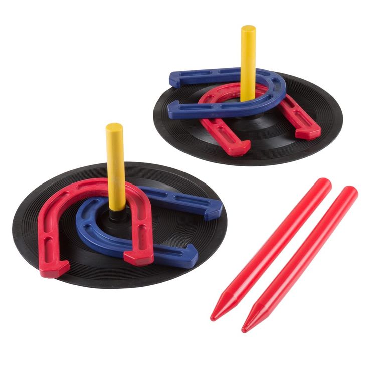 two black and red plastic toys on top of each other with yellow sticks in the middle