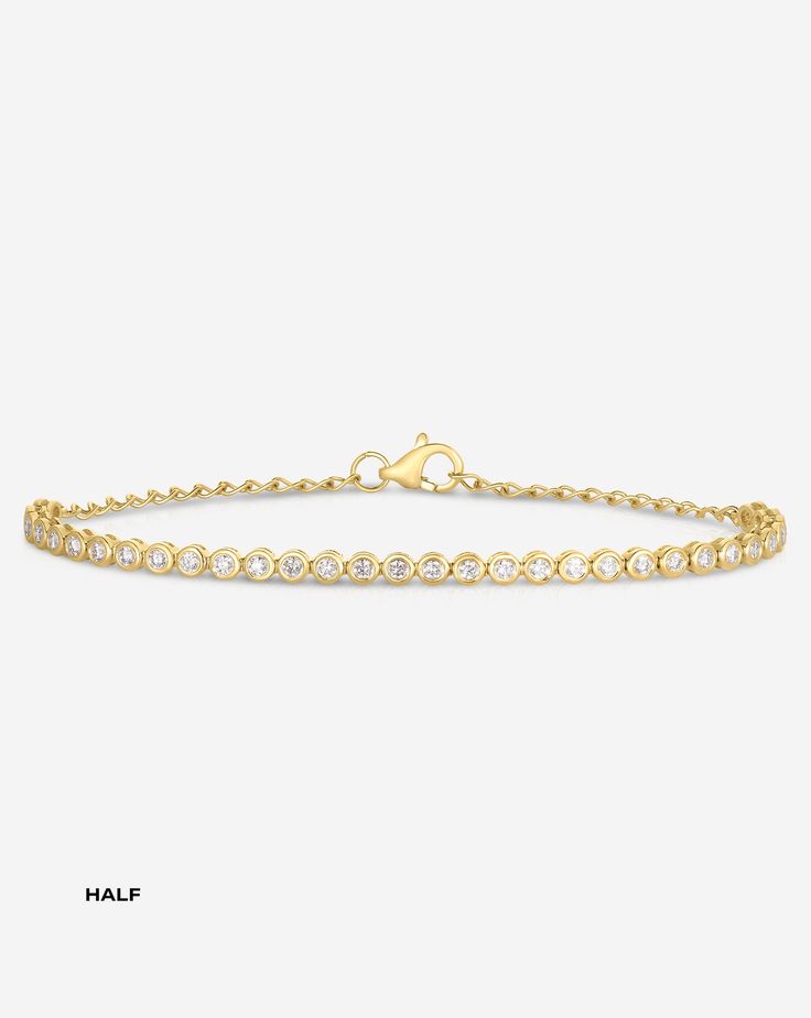 14k solid gold Round, natural diamonds: Color: I-J Clarity: SI Lobster clasp closure Half coverage: 30 round, natural diamonds Total carat weight: approximately 0.51 Diamond coverage: 3.25 inches Length: 5.5-7 inches, adjustable Width: 2.5 mm Eternity coverage: 52 round, natural diamonds Total carat weight: approximately 0.89 Diamond coverage: 5.5 inches Length: 6-7 inches, adjustable Width: 2.5 mm Adjustable Diamond Bracelet With Diamond Accents, Yellow Gold Diamond Bracelet With Diamond Cut, Fine Jewelry Gold Diamond Bracelet Vvs Clarity, Formal Gold Bracelet With Brilliant Cut Diamonds, Formal Gold Diamond Bracelet With Brilliant Cut, Formal Yellow Gold Diamond Bracelet With Brilliant Cut, 14k Gold Diamond Bracelet With Brilliant Cut For Anniversary, 14k Gold Bracelet With Diamond Accents, 14k Gold Brilliant Cut Diamond Bracelet For Anniversary