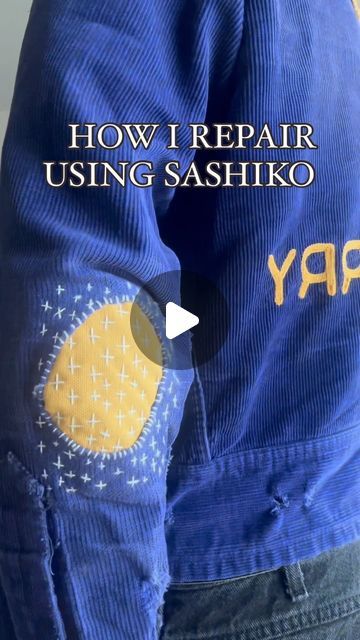 the back of a person's jacket with text overlaying how repair using sashiko