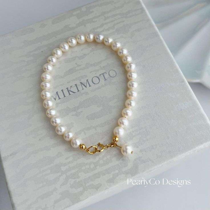 The effortless elegance of this bracelet can be added to your daily outfit and parties, made of 100% natural freshwater pearls. 🤍Natural Freshwater pearls 5-6mm 💛Material: 14K Gold filled (long-time lasting quality). ❤️Adjustable length. 💙Closure: spring ring clasp 🧡Total Length: 18cm (wrists around 14.5-16cm) Or customized.  *Please send me your wrist measurement and also note the bracelet will be a little loose to buckle. Package list : ♥ 1 bracelet; ♥ 1 linen bag; ♥ 1 plastic storage bag; Elegant Baroque Pearl Bracelet For Wedding, Delicate Pearl Drop Bracelet For Formal Occasions, Elegant Single Strand Baroque Pearl Bracelet, Pearl White Bracelets With Pearl Pendant For Weddings, Single Strand Akoya Pearl Bracelet Gift, Elegant Single Strand Baroque Pearl Bracelets, Delicate Formal Pearl Bracelet, Minimalist Pearl Bracelet For Anniversary With Pearl Chain, Minimalist Pearl Drop Bracelet For Anniversary