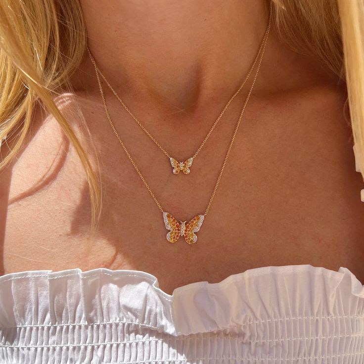 Eriness | Mini Sunshine Butterfly Necklace Our attraction to butterflies not only comes from their visual appearance but the meaning behind these whimsical creatures. Our Mini Sunshine Butterfly Necklace is a small reminder to embrace change and all the beauty that comes with it. Stack this necklace with our Diamond Baguette Drop Necklace. 18 inches 0.22 Carats- Yellow Sapphire 0.07 Carats- Diamond SBN108-YG-YS-WD All sales are final. Ombre Butterfly, Whimsical Creatures, Instagram Men, Diamond Baguette, Diamond Stacks, Gold Ear Cuff, Ear Cuff Earings, Embrace Change, Colorful Gifts