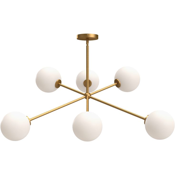 a brass chandelier with five white balls hanging from the middle and four gold arms