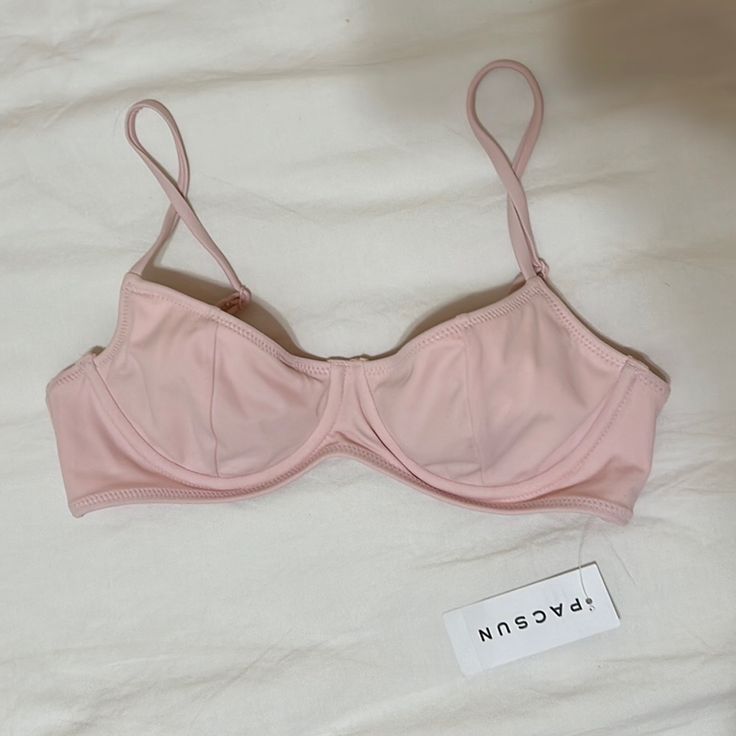 Super Cute Light Pink Bikini Top From Pacsun, New With The Tag. Very Flattering And Has Underwire, Adjustable Straps, And A Back Clasp. The Perfect Girly And Coquette Piece For Swimming! Summer Bra With Removable Pads For Sunbathing, Summer Vacation Bra With Padded Cups, Summer Beachwear Bra For Sunbathing, Summer Stretch Padded Bra, Beachwear Bra For Poolside Summer, Summer Beachwear Bra For Poolside, Summer Seamless Bra For Sunbathing, Seamless Summer Bra For Sunbathing, Padded Bra For Sunbathing In Summer