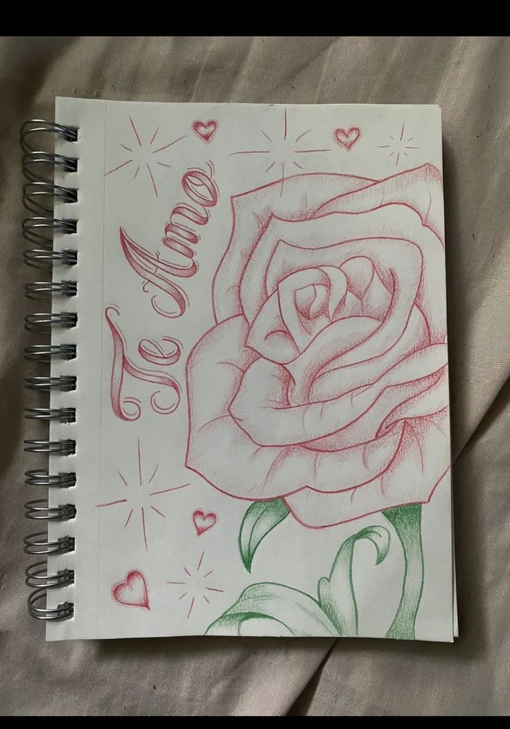 a drawing of a rose with the word love written in cursive writing on it