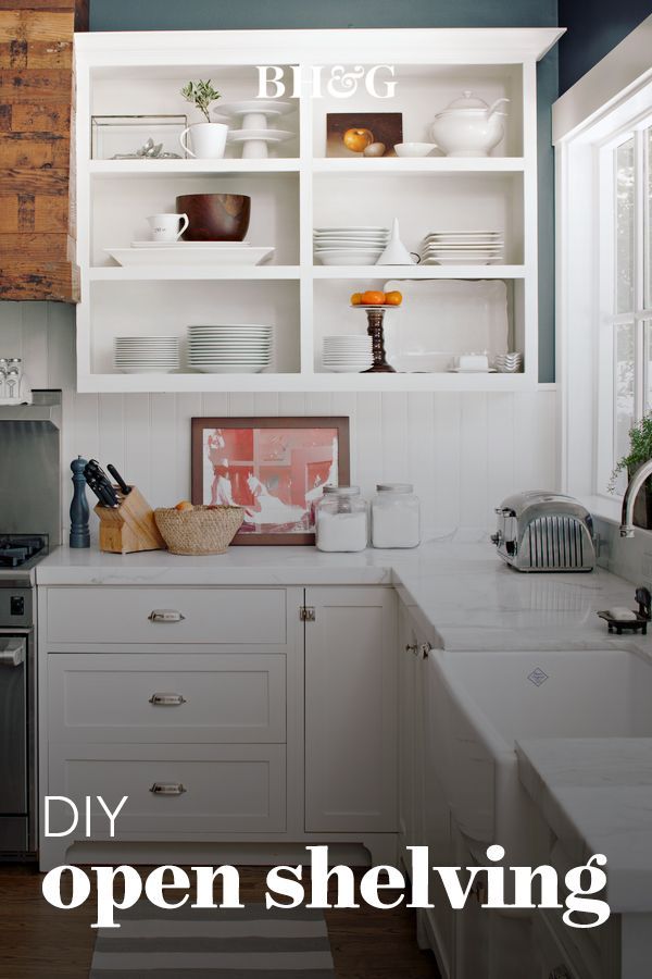 an open shelving unit in a kitchen with the words diy open shelving above it