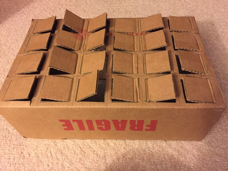 several boxes stacked on top of each other with the word ewcite printed on them