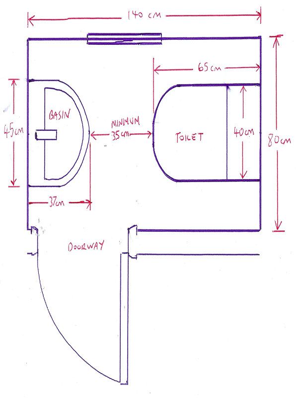 a drawing of a bathroom with measurements for the toilet and sink area, along with an adjacent shower stall